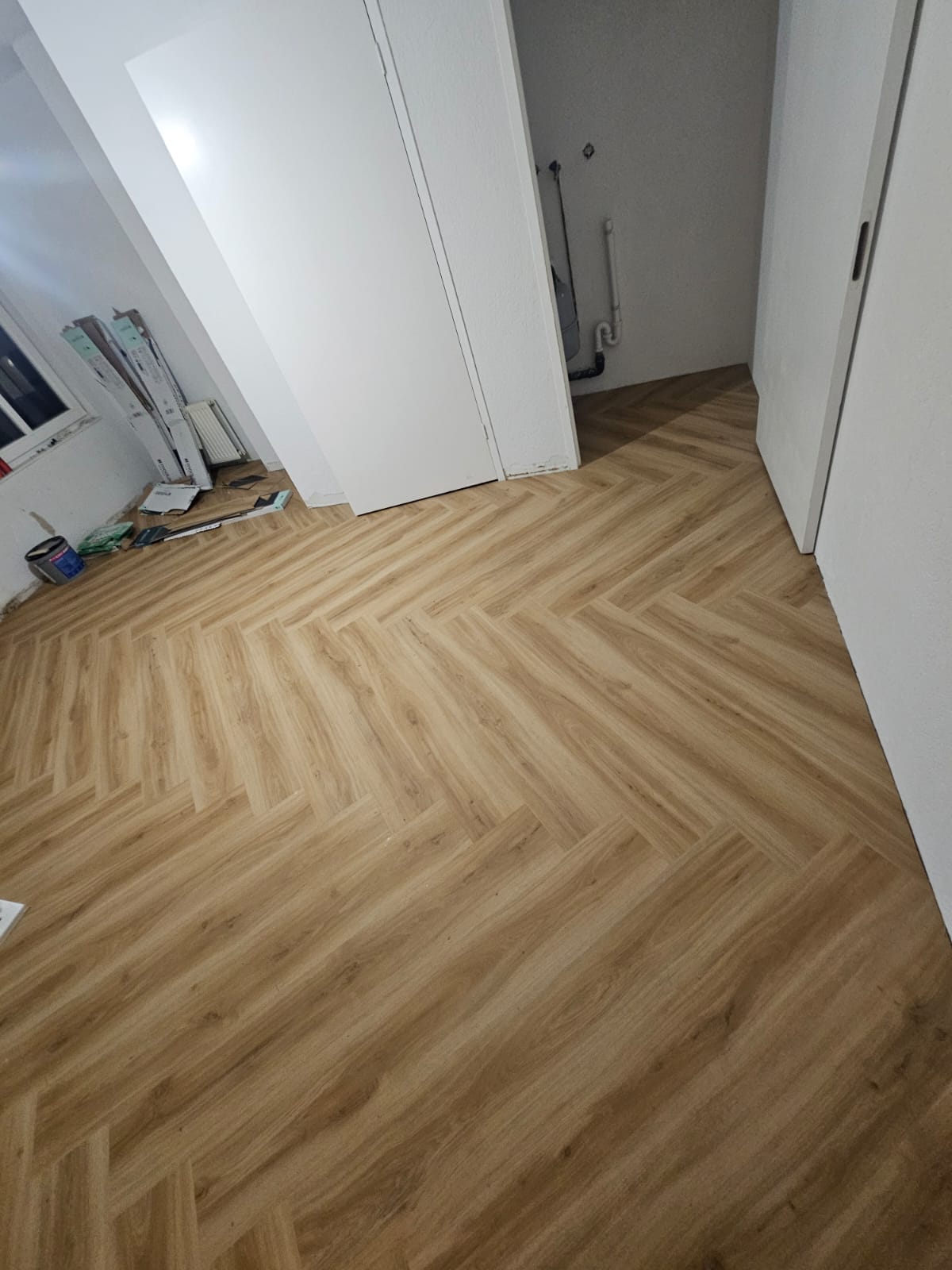 Stunning herringbone flooring installation in living room